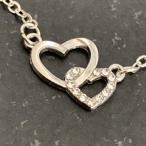 Hugging Hearts Silver Necklace – Rhinestone Pendant, 16–18”